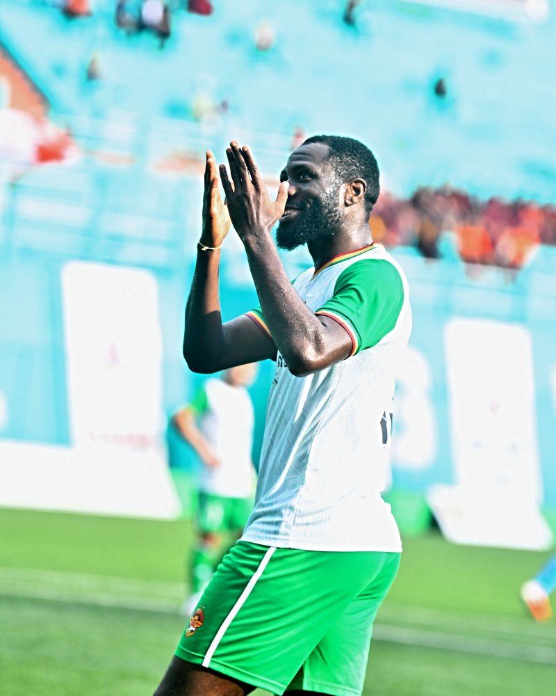 Dennis Antwi celebrating after scoring a goal.