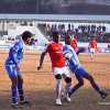 The match of ONGC I-League between Shillong Lajong FC (Red jersey) and Viva Kerala (Blue jersey) in action at JN Sports Stadium, Polo on Saturday.